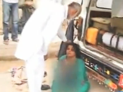 Woman dragged on streets by husband over a domestic fight